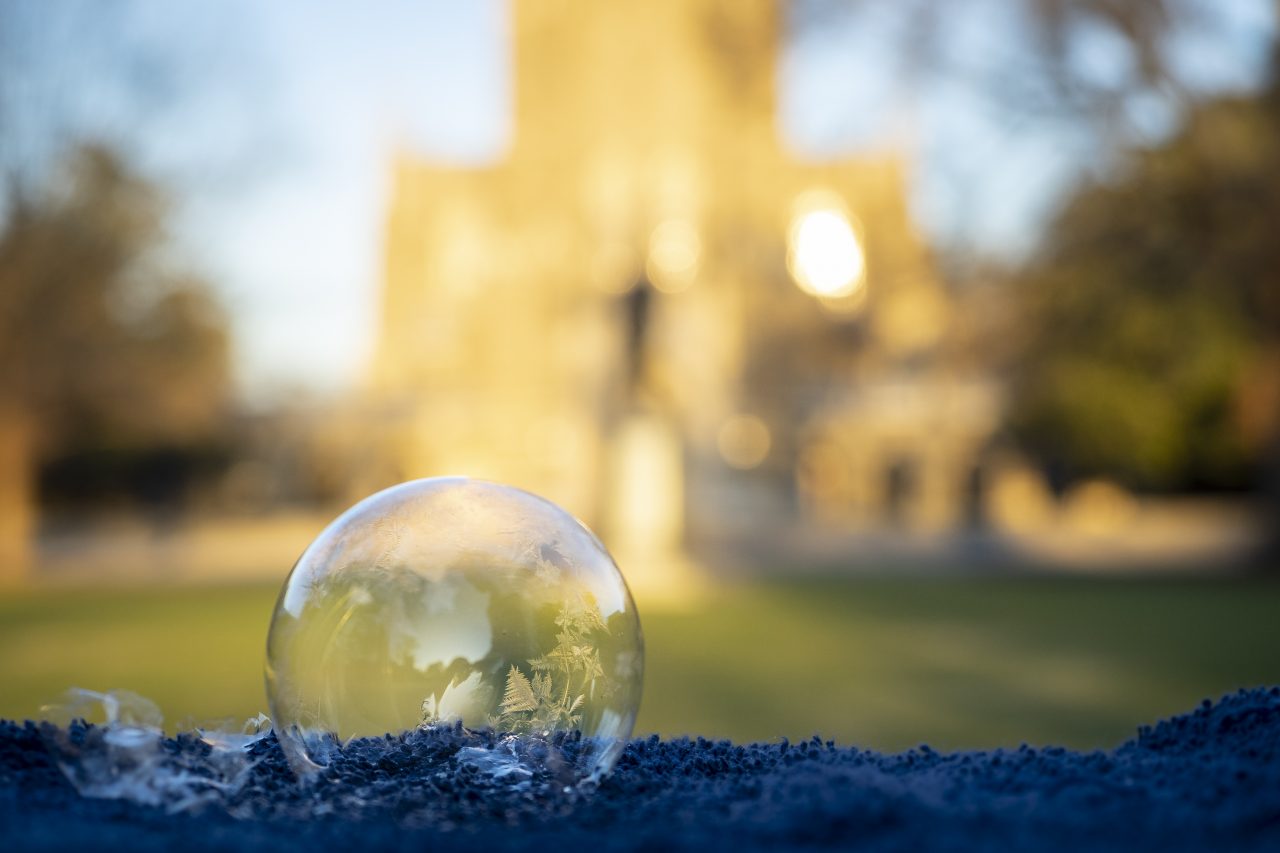 photo of bubble in front of chapel at dawn